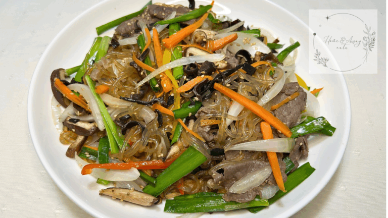 Authentic Korean Japchae with colorful vegetables and beef