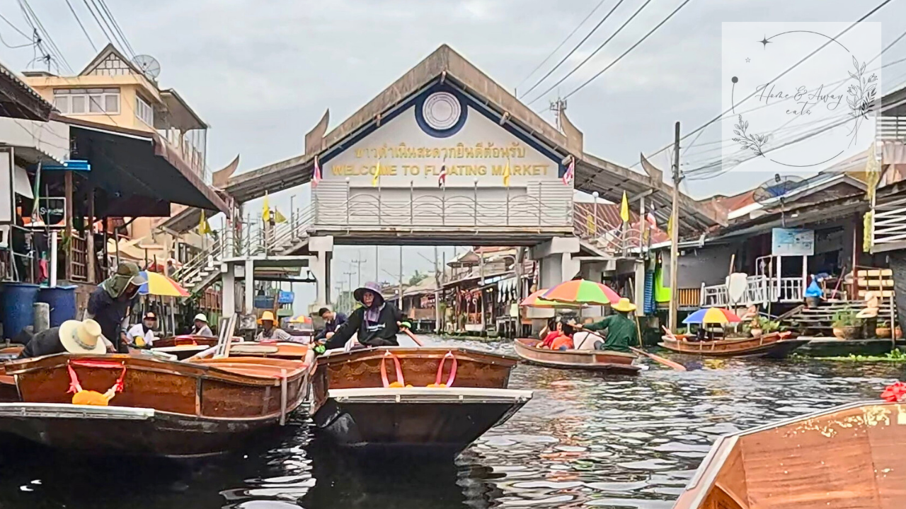 Boats selling fruits and snacks at Damnoen Saduak Floating Market, Thailand