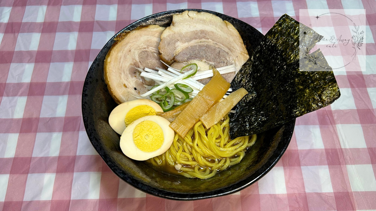 Bowl of homemade Shoyu Ramen with chashu, egg, seaweed, and green onions